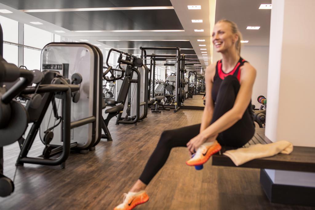 Downtown Rotana Hotel Al-Manamah Bagian luar foto A woman in a gym